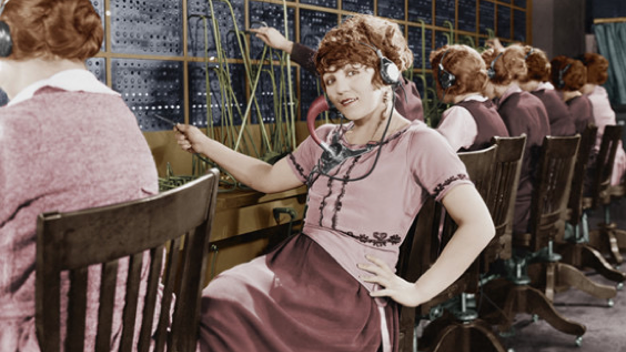 Historic photo of telephone switchboard operators at work